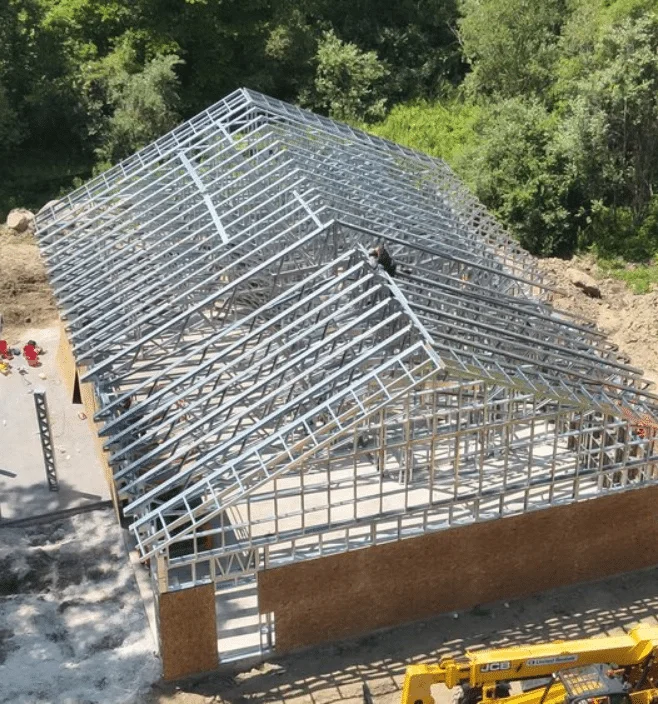 Aerial view of steel frame barndominium construction in Kansas